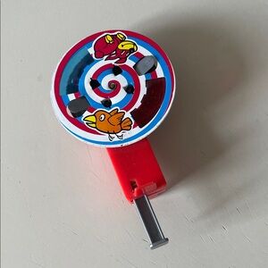 Colorful Toy Spinner with Red Handle